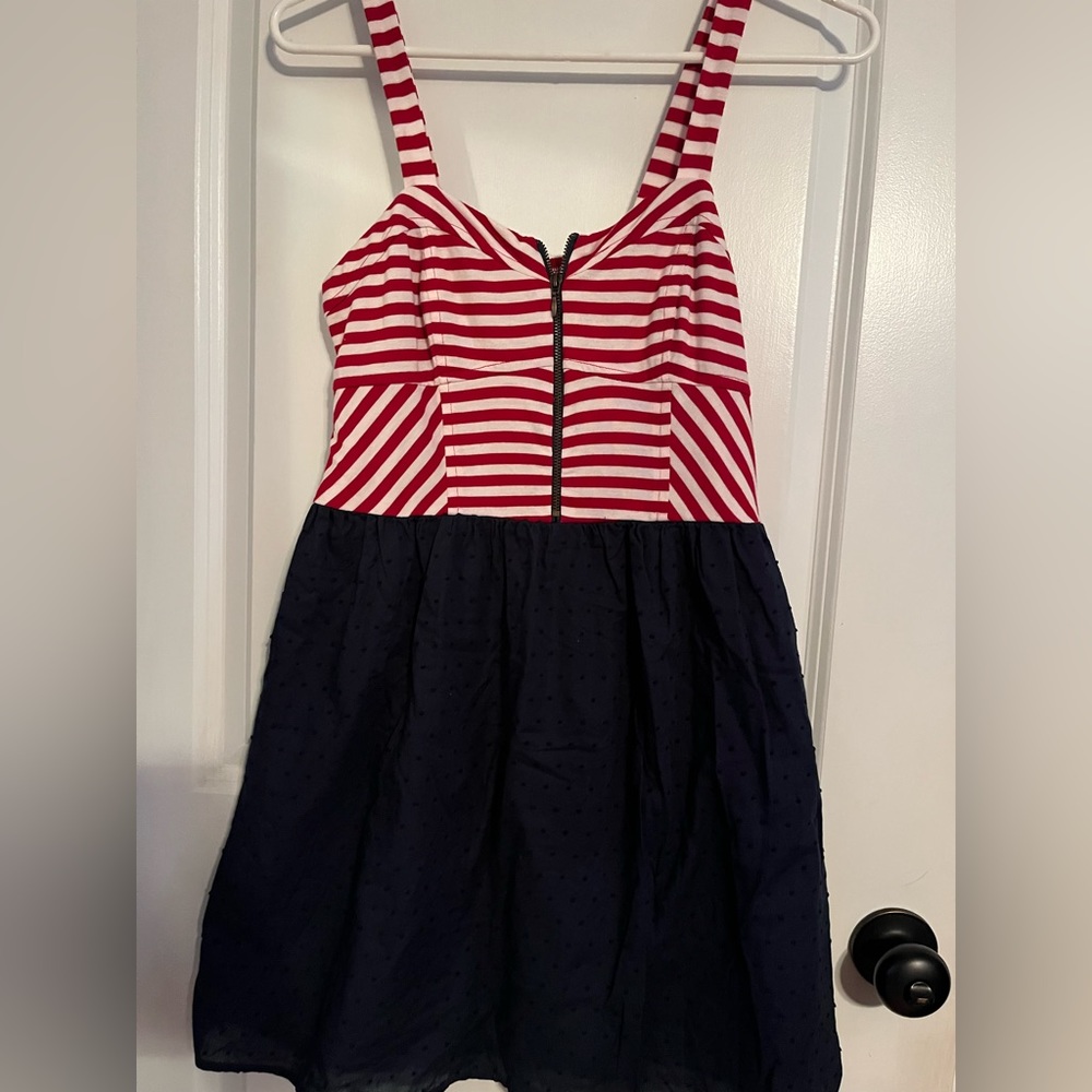 A red and white striped dress with blue at bottom size medium xhilaration brand!